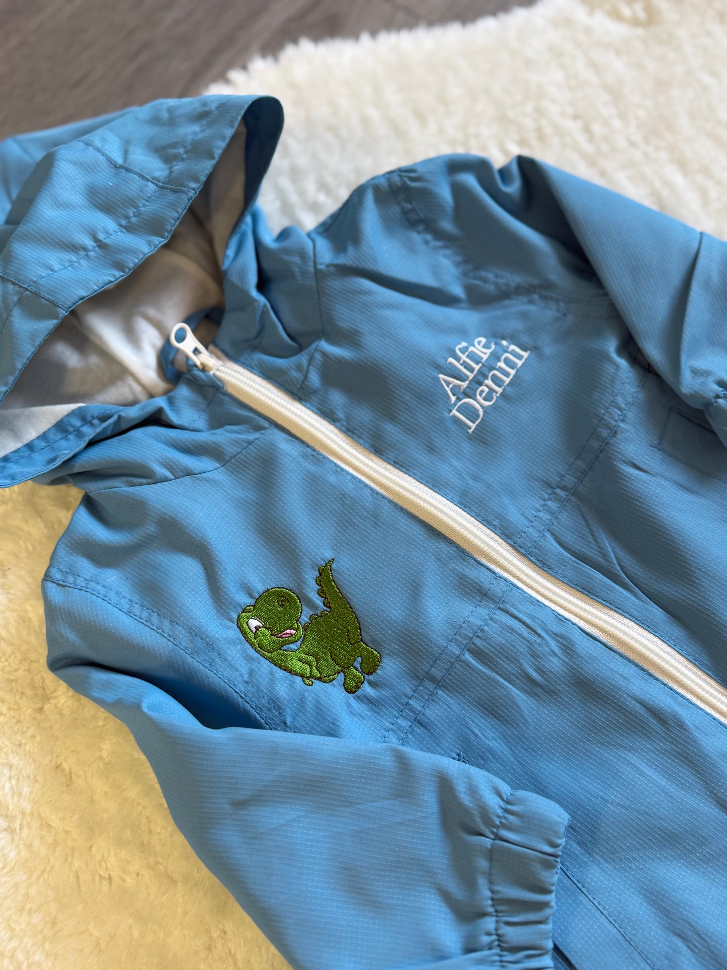 Embroidered Dinosaur Blue Raincoat With Name