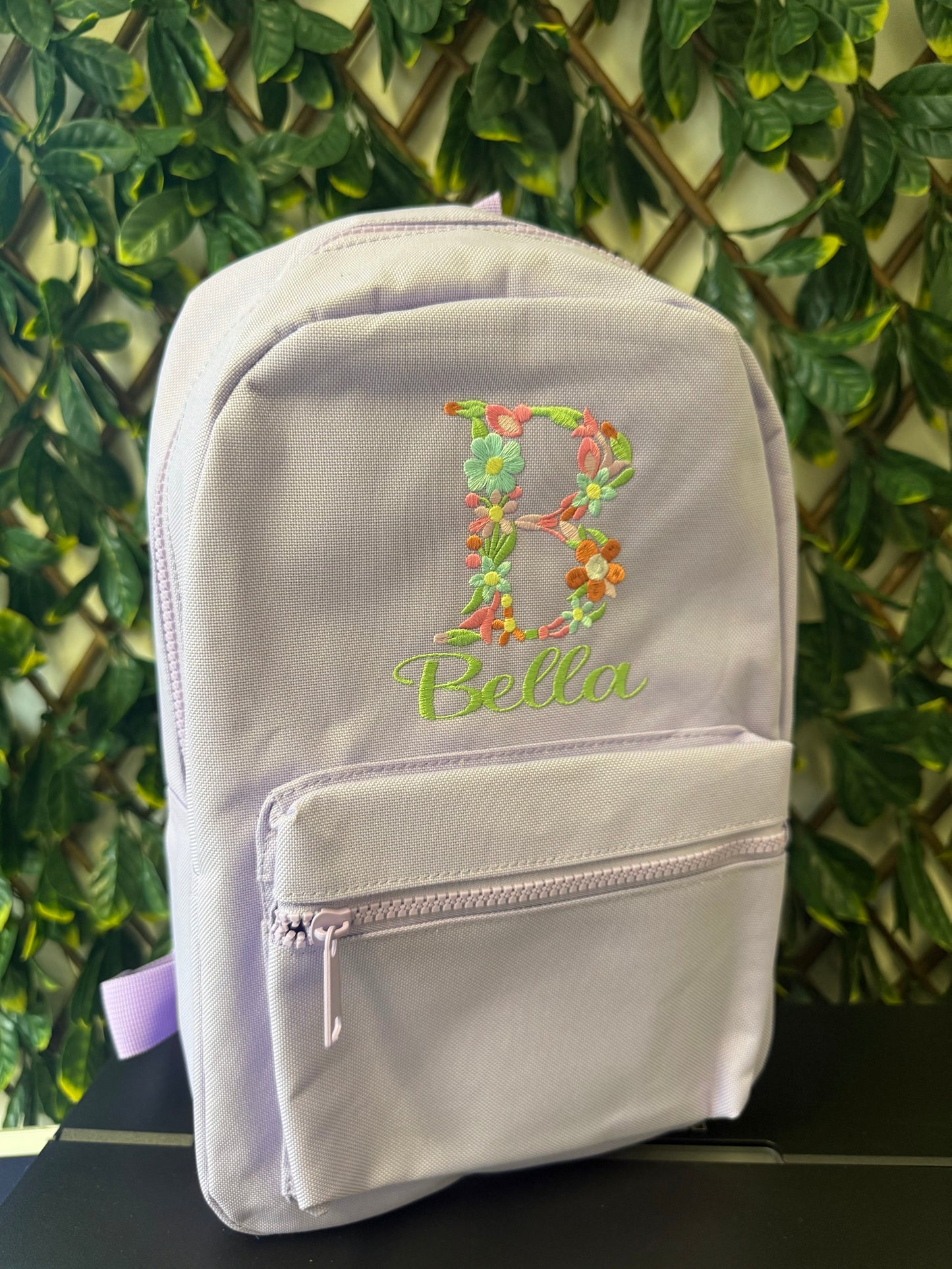 Embroidered floral initial backpack 7L