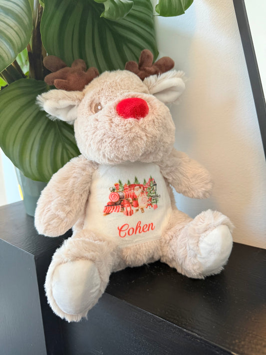 Reindeer mumbles Christmas bear - red train