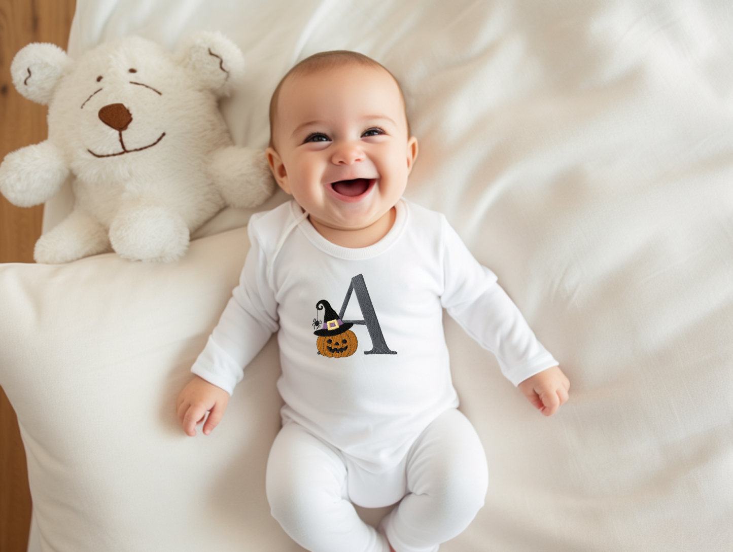 Halloween pumpkin initial embroidered babygrow