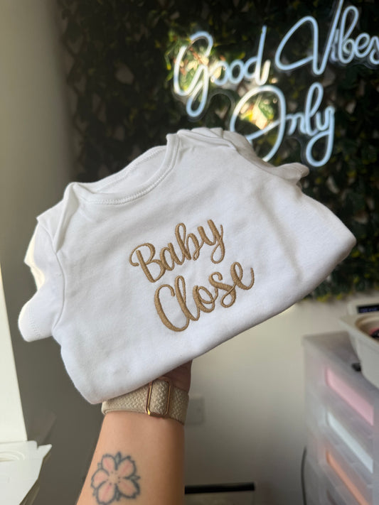 Embroidered name baby vest