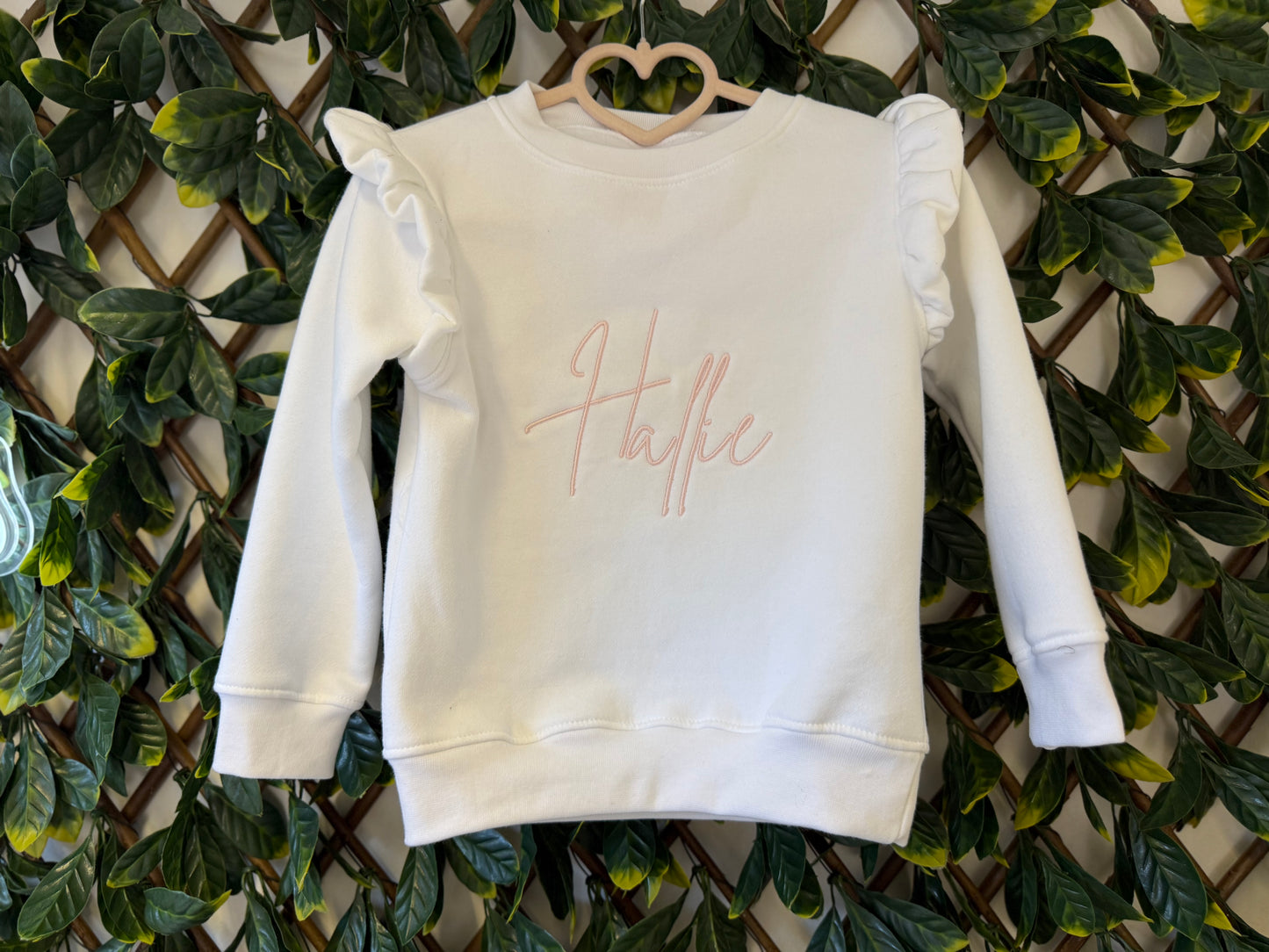 Embroidered White frilled sweatshirt