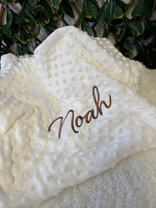 White embroidered bubble blanket