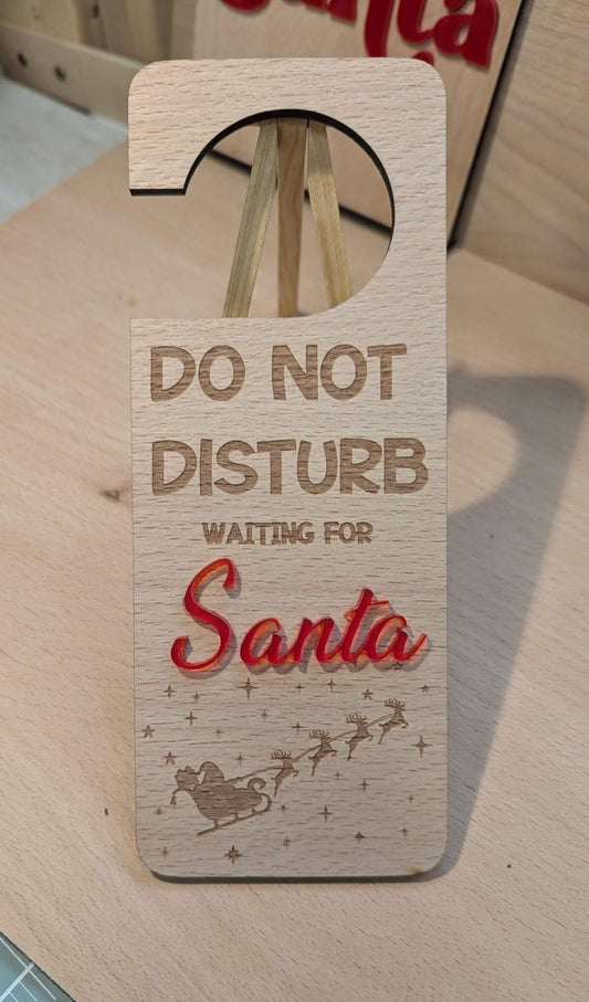 Wooden engraved do not disturb waiting for Santa sign
