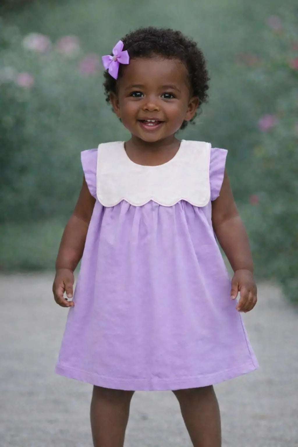 Embroidered girls bib initial dress