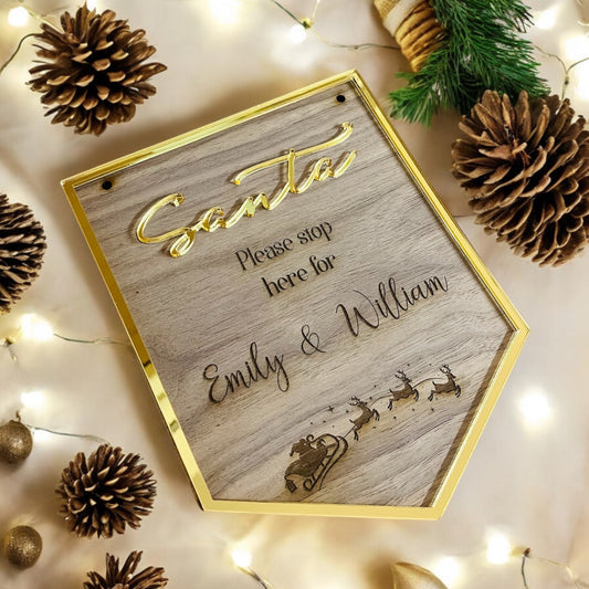 Gold and wooden Santa stop here engraved sign