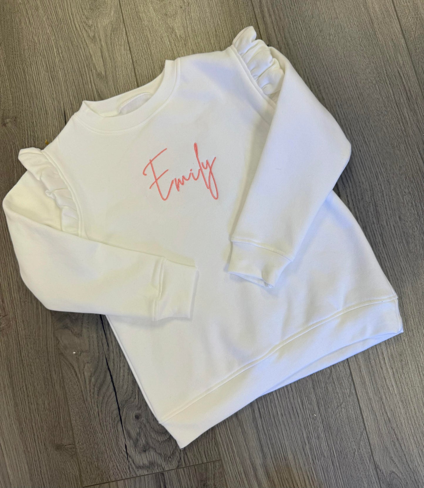Embroidered White frilled sweatshirt
