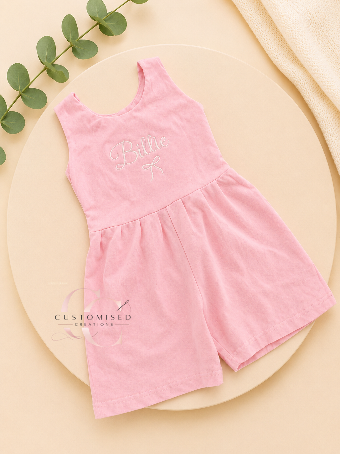 Embroidered girls bow all in one playsuit with bow design under name