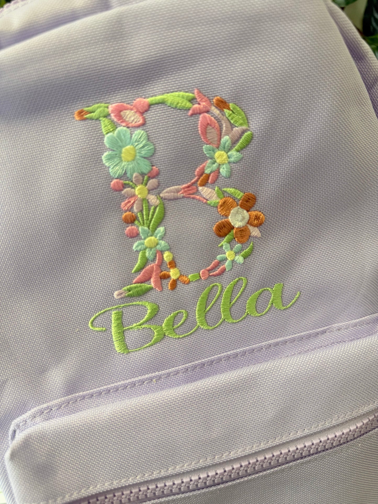 Embroidered floral initial backpack 7L