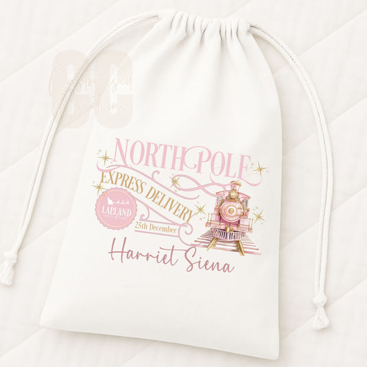 Pink north pole Christmas drawstring gift bag