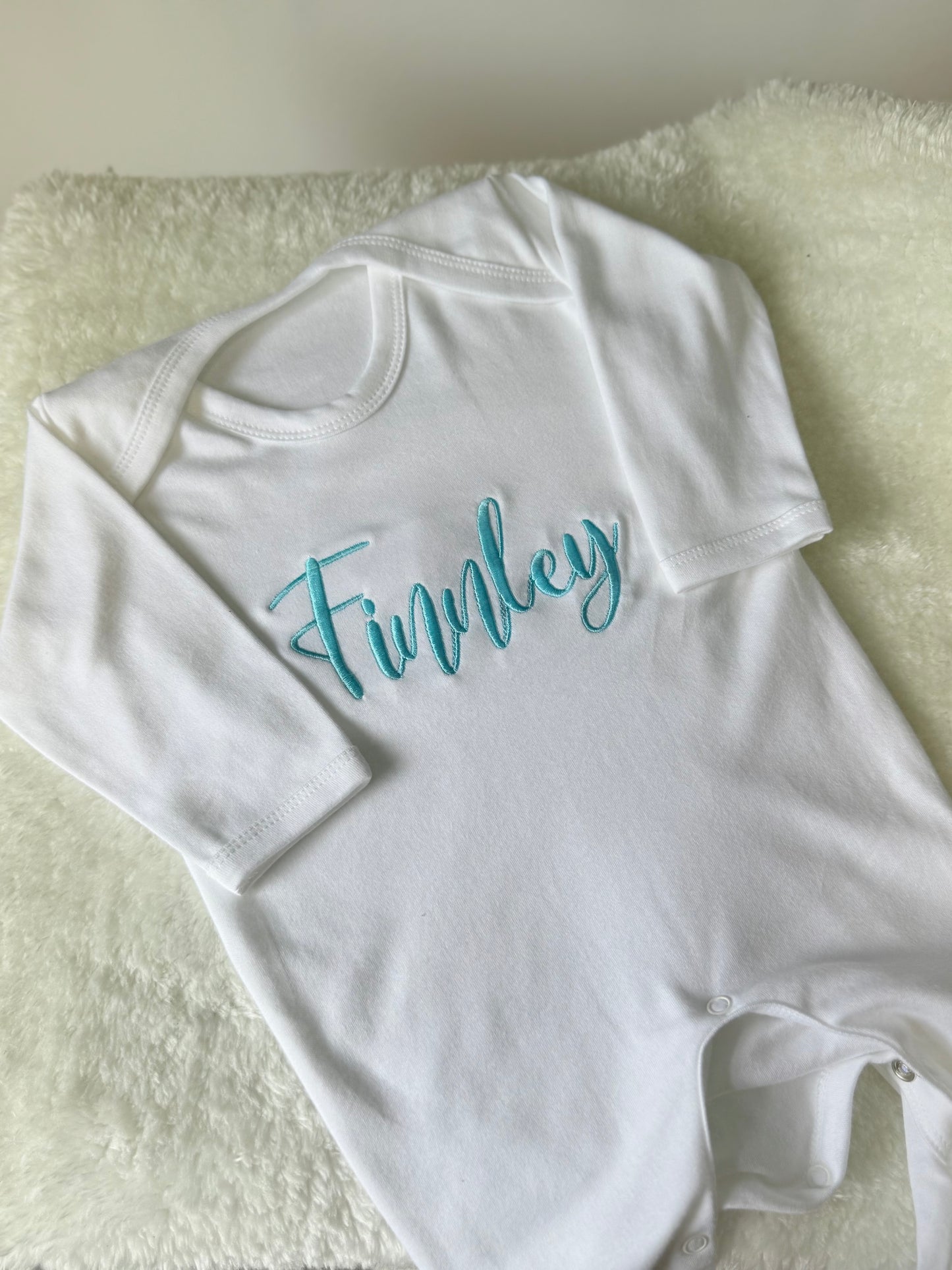 Embroidered babygrow with child's name