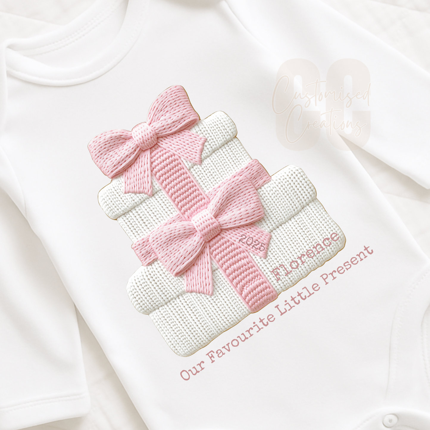 Pink Our favourite little present Christmas embroidery effect bib/babygrow/vest