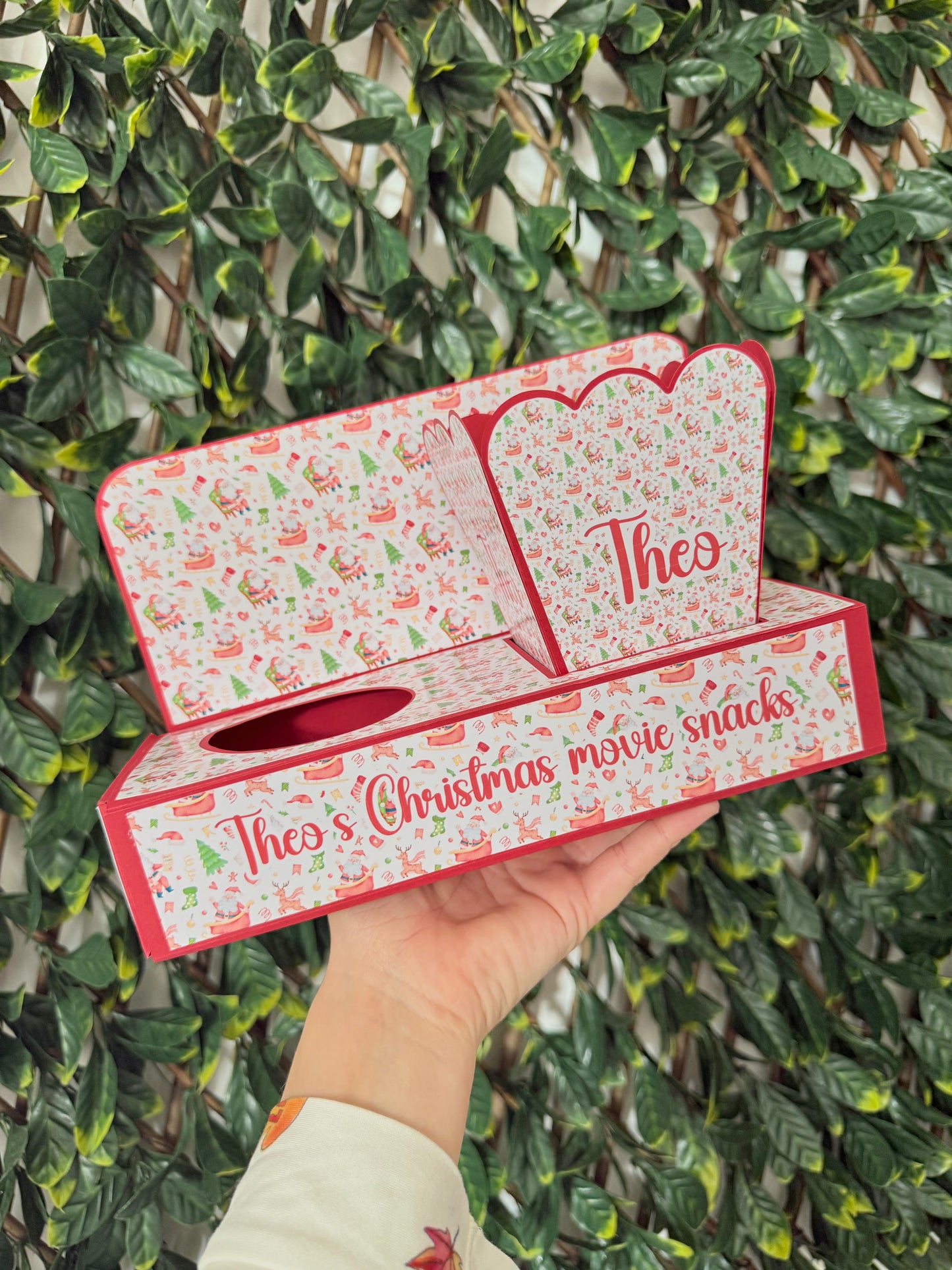 Festive Christmas movie snack tray with popcorn holder