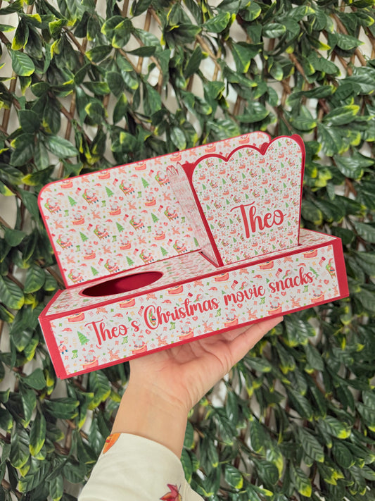 Festive Christmas movie snack tray with popcorn holder