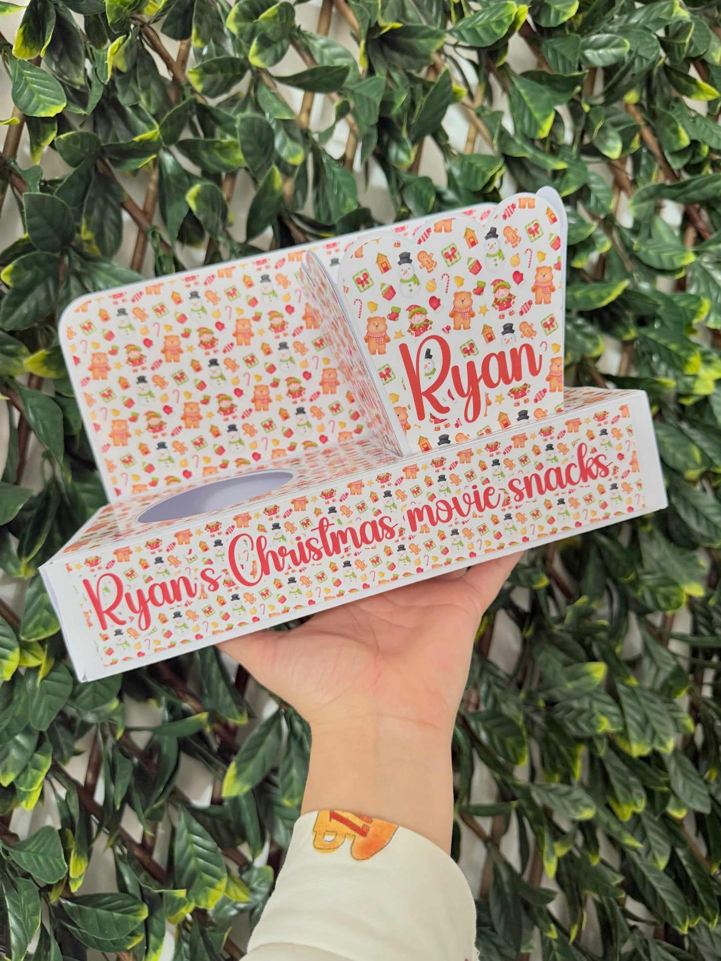 Festive Christmas movie snack tray with popcorn holder