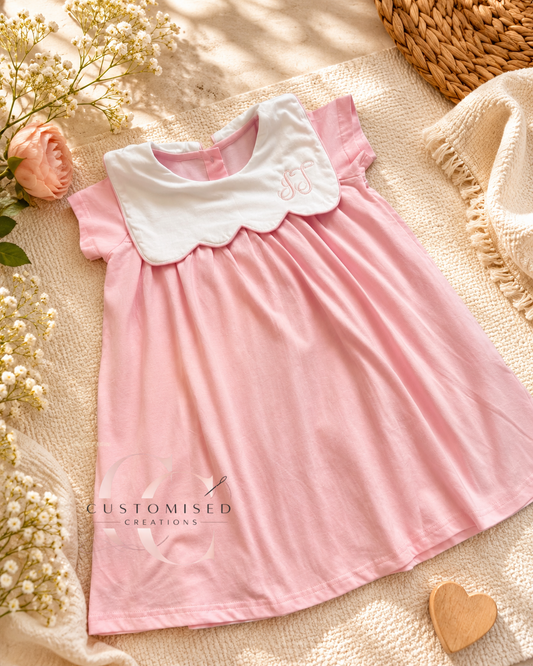 Embroidered girls bib initial dress